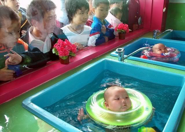 Baby swim in the tub