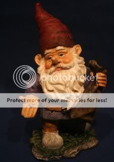 Red Hat Garden Gnome holding Brown Sack